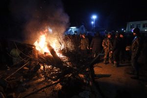 Ukrainoje protestuotojai susirėmė su policija dėl evakuotųjų iš Kinijos